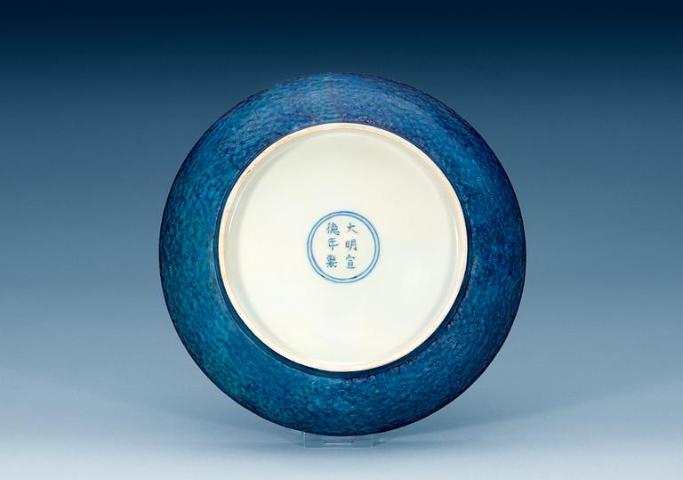 A 'peacock turquoise glazed' dragon dish, Ming dynasty, with Xuande´s six character mark and of the period (1425-1435).