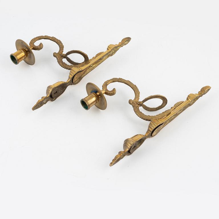A pair of 'Törne' brass one-light wall ligths from IKEA's 18th Century collection.