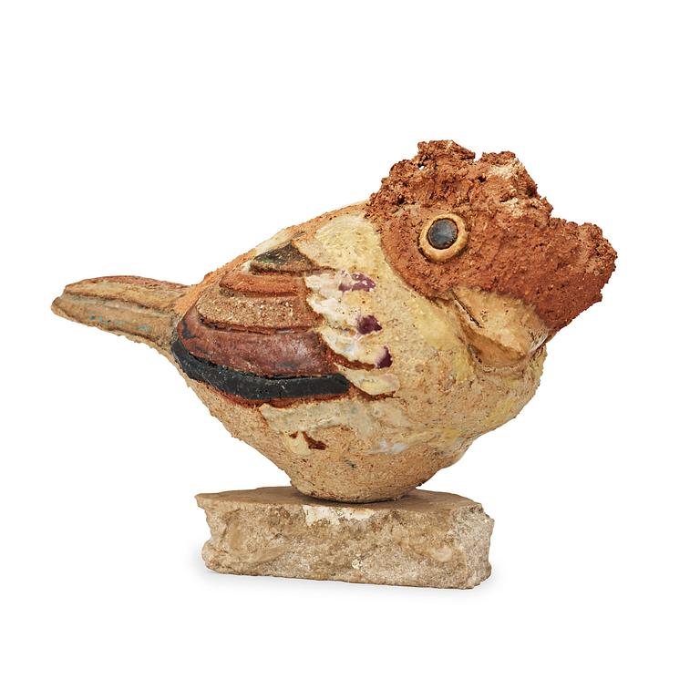 A Tyra Lundgren stoneware sculpture of a bird.