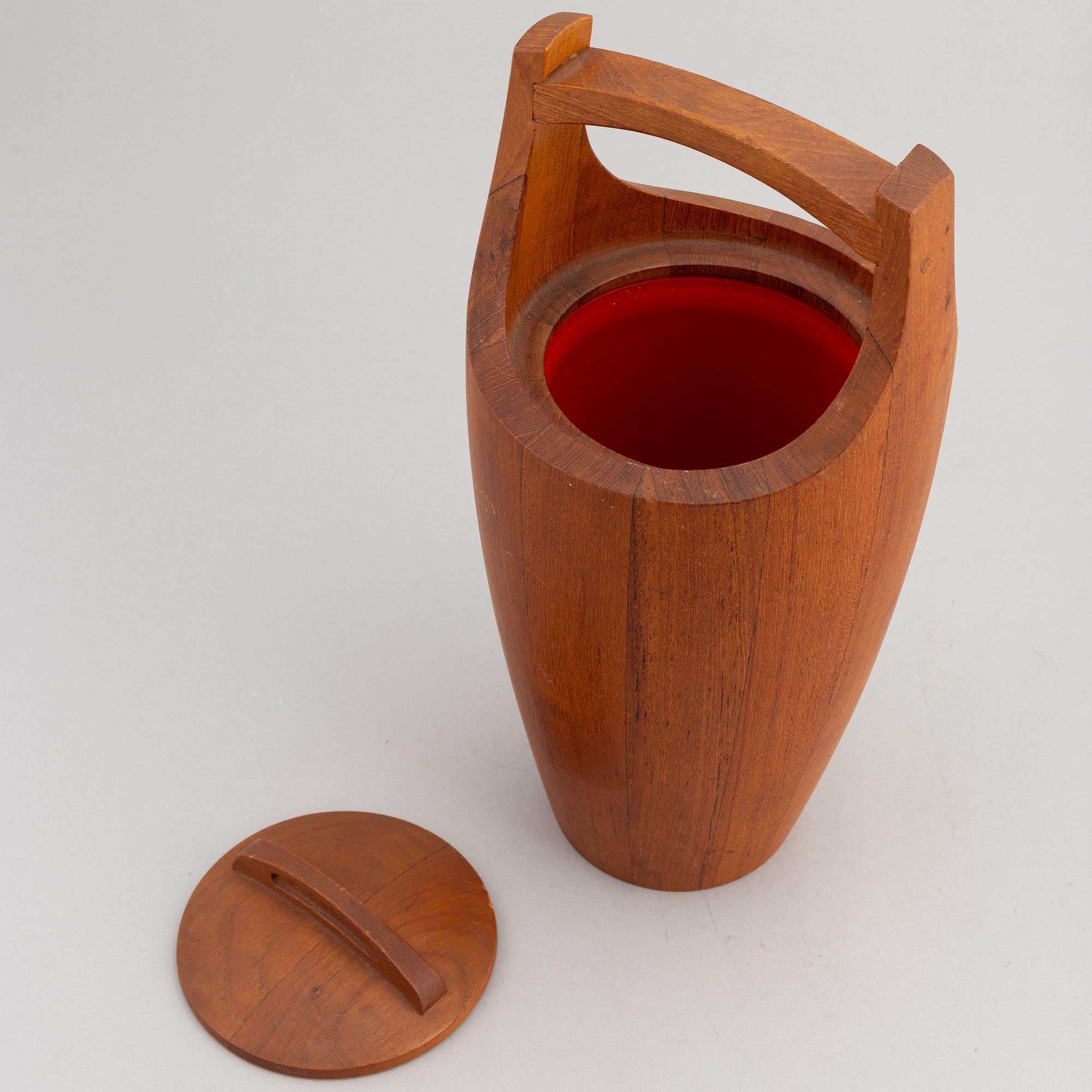 A 1950s 'Congo' teak ice bucket by Jens Quistgaard, Dansk Designs, Denmark.