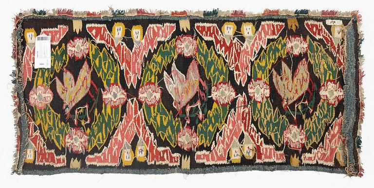 A carrige cushion, "Noaks duva" ('Noah's dove'), tapestry weave, c. 95.5 x 44 cm, Torna district, Southwestern Scania.