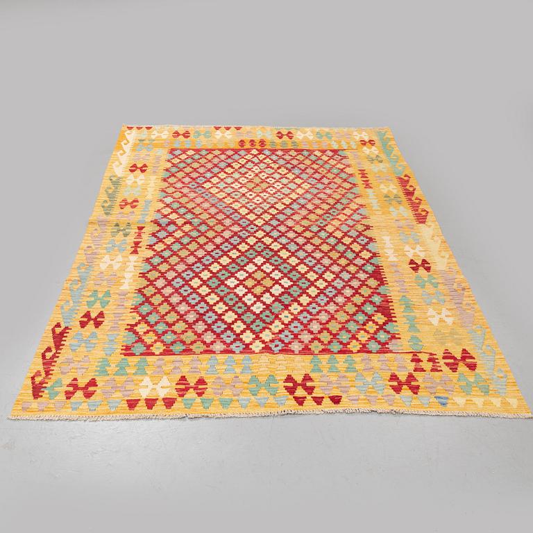 A rug, kilim 245 x 185 cm.