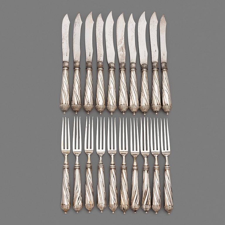 A set of twenty 18th century silver knifes and forks, unidentified marks.