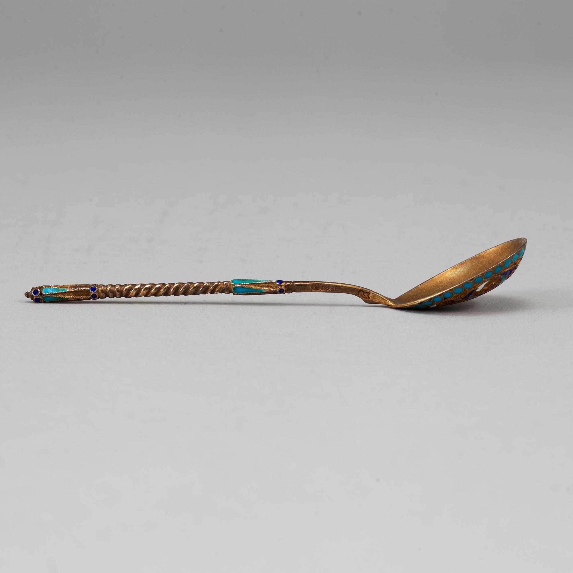 A set of twelve 19th century silver-gilt and cloisonné enameled tea-spoons, marked Gustav Klingert, Moscow 1880's.