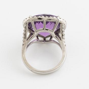 Heart shaped amethyst and brilliant cut diamond ring.