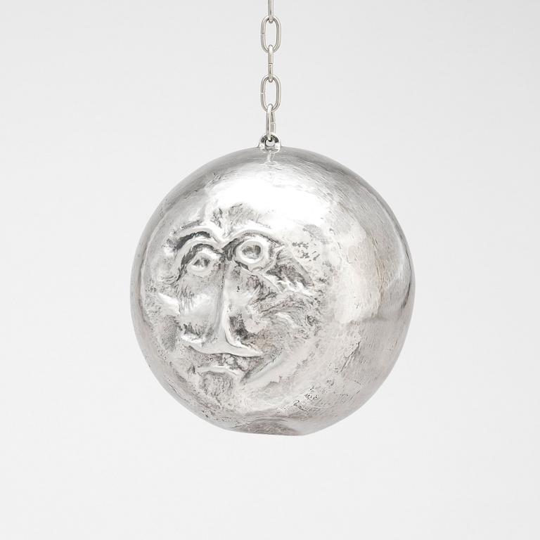 Olle Ohlsson, a silver 'man in the moon' sculpture, Stockholm.