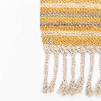 Barbro Nilsson, a carpet, "Spättan, gul", flat weave, ca 269 x 146 cm, signed AB MMF BN.