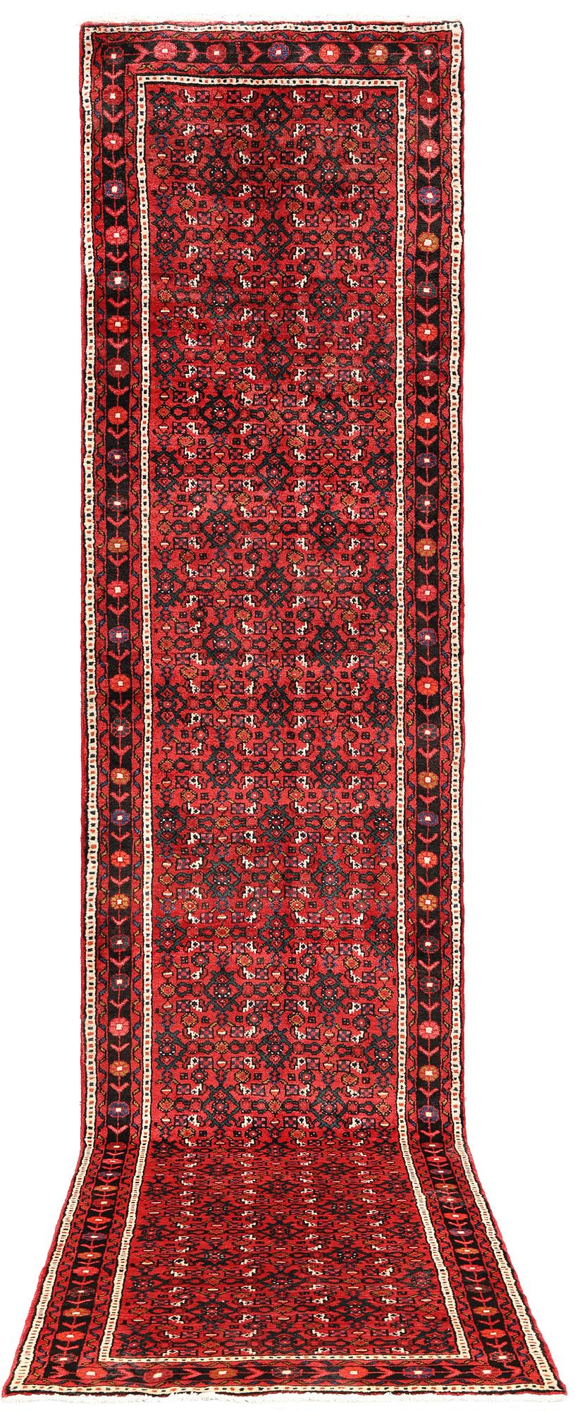 A Hosseinabad runner, c 414 x 95 cm.