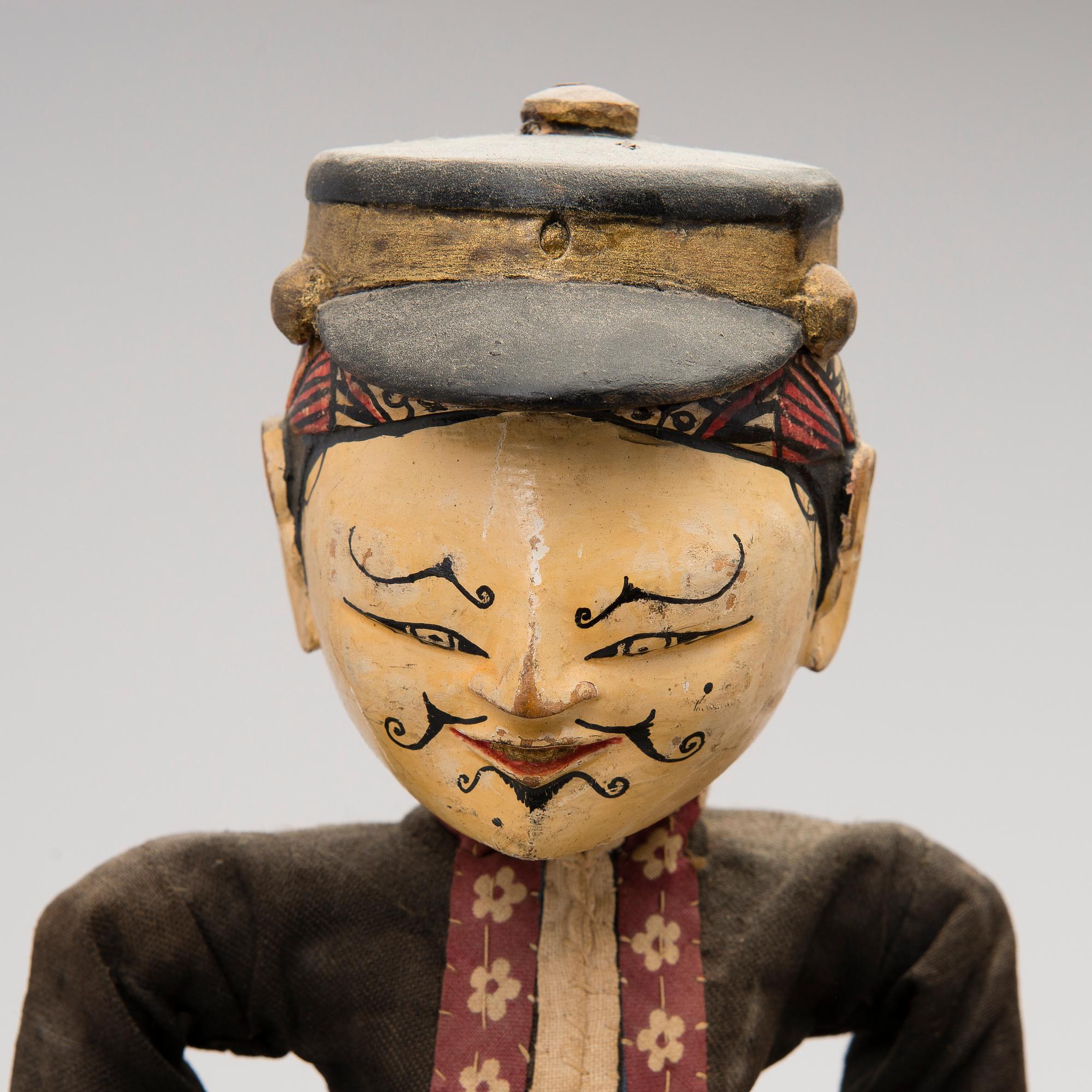 Six theatre dolls from Bali, presumably from the first half of the 20th Century.