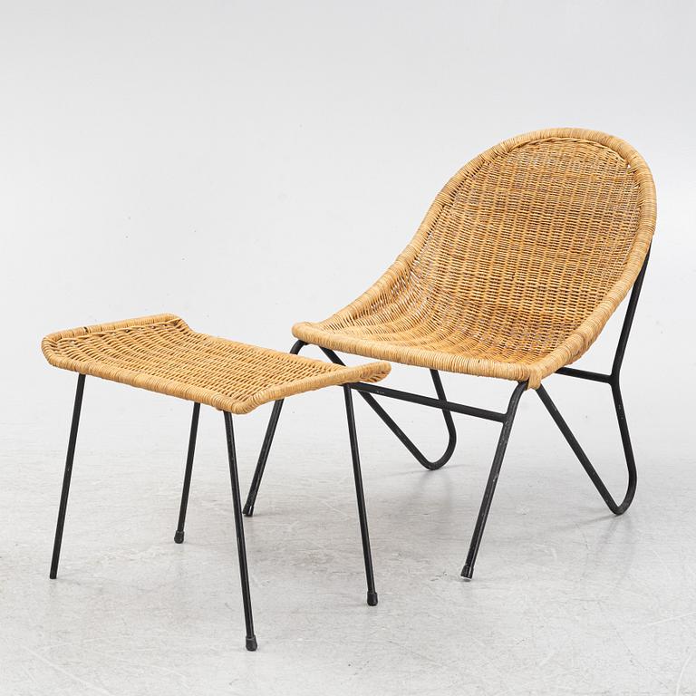 A rattan chair with ottoman, 1950's.