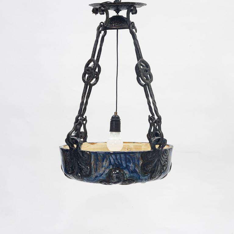 A Swedish Art Nouveau ceramic and iron ceiling light, Höganäs, early 20th century.