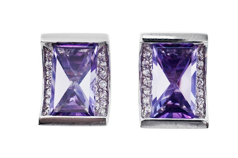 A PAIR OF AMETHYST EAR STUDS.