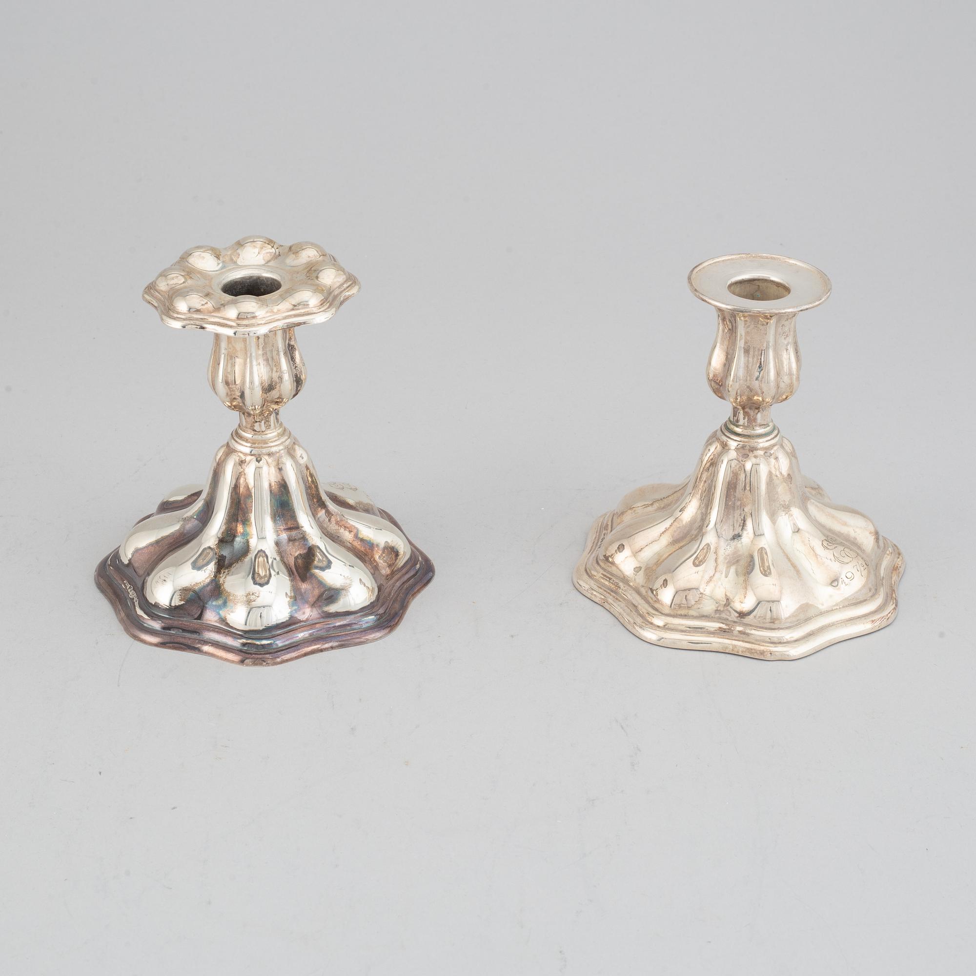 CG Hallberg, kandelaber samt ett par ljusstakar, silver, rokokostil, Stockholm, 1936 och 1935.
