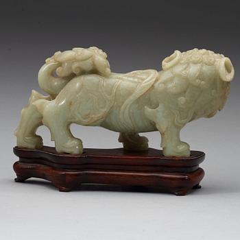 A green nephrite mytological lion, 20th century.