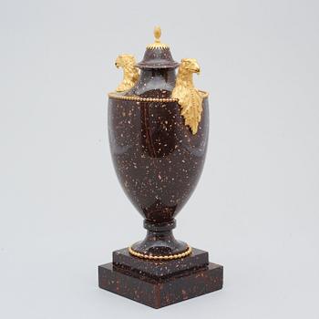 A Swedish late Gustavian 19th Century porphyry and gilt bronze urn.