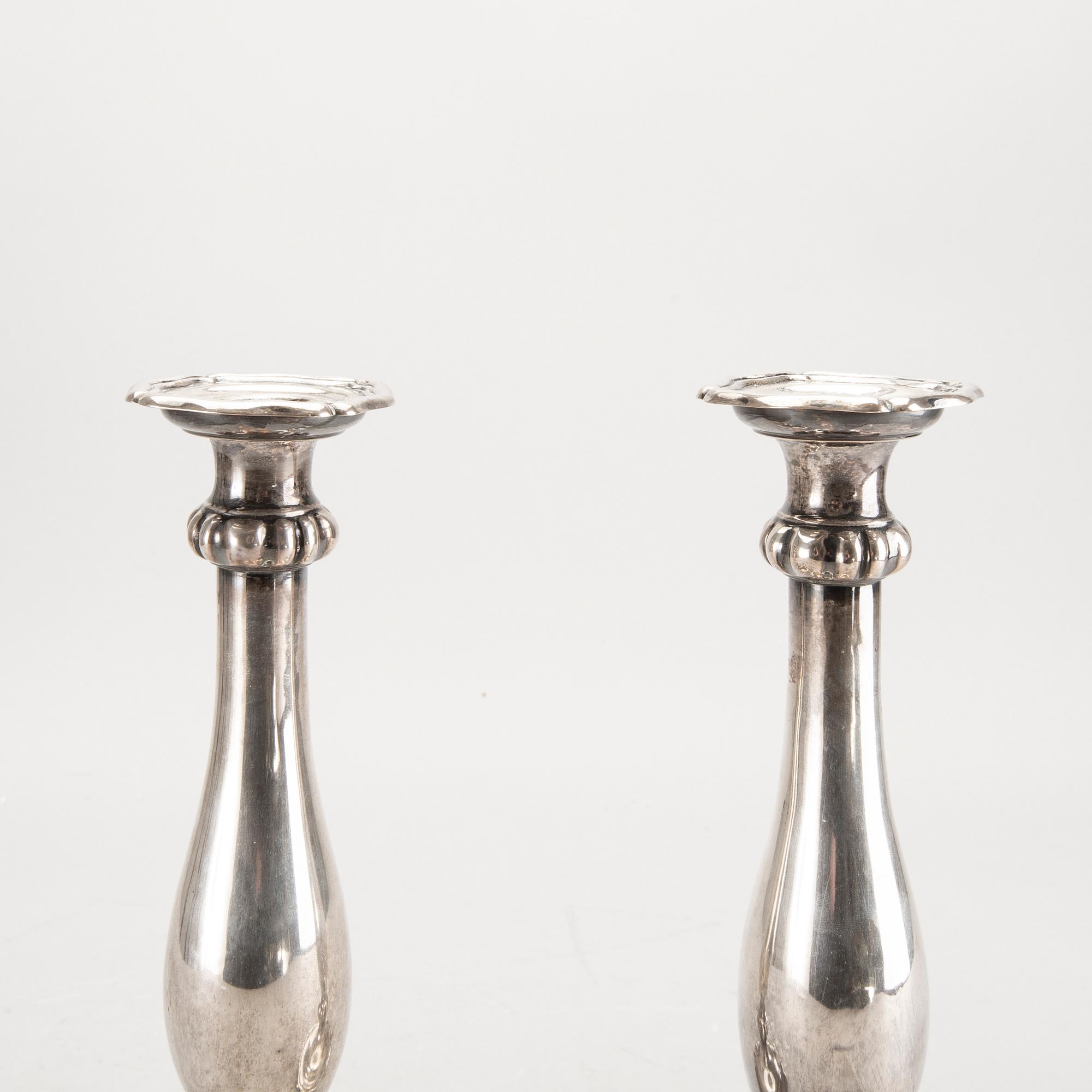 A pair of Austrian silver candle sticks Vienna 1852 weight 626 gr.
