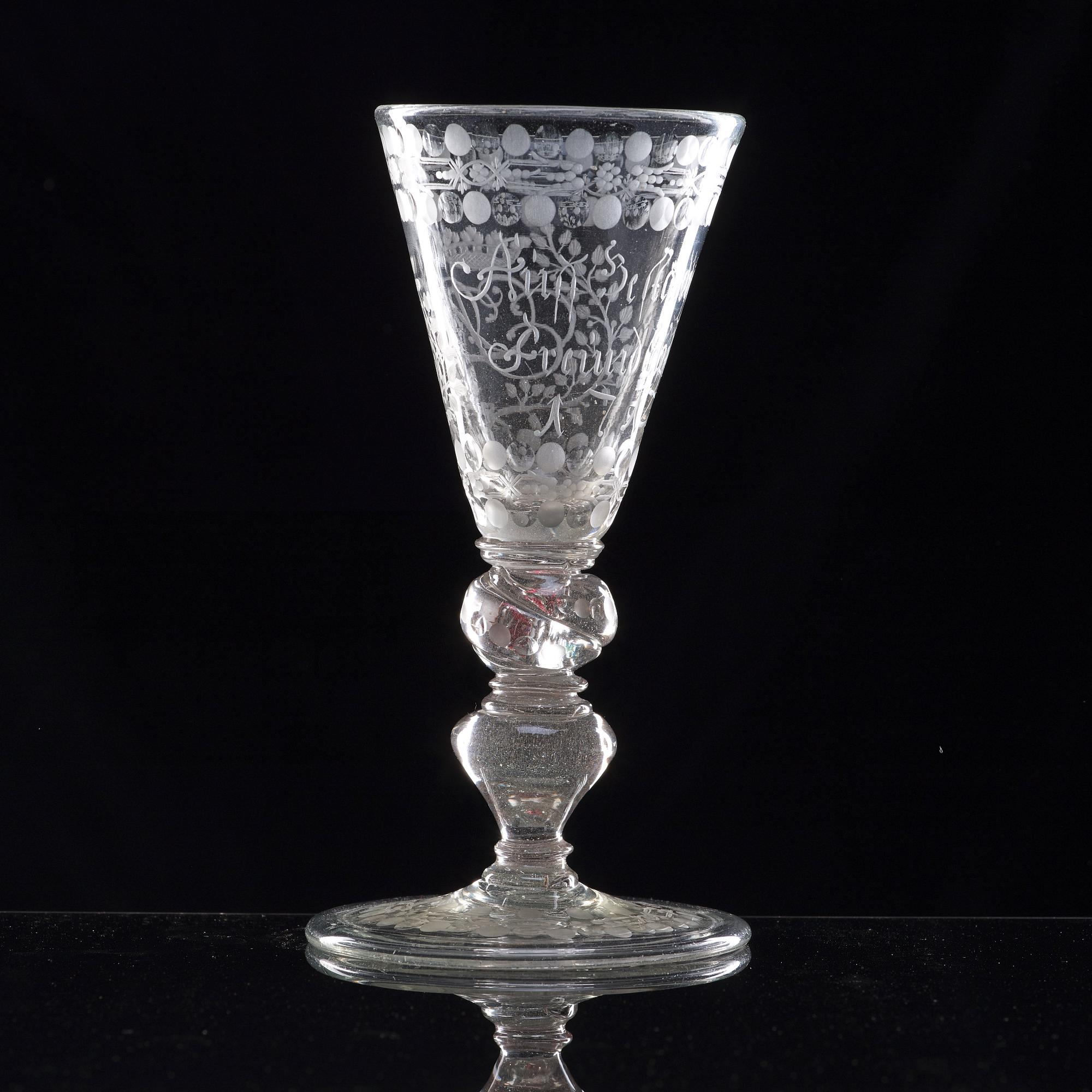 A German cut and engraved glass goblet, 18th Century.