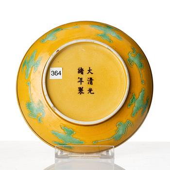 A yellow ground dragon dish, Qing dynasty with Guangxu six character mark and period (1875-1908).