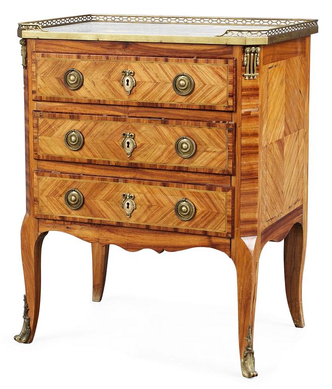A Louis XVI-style commode.