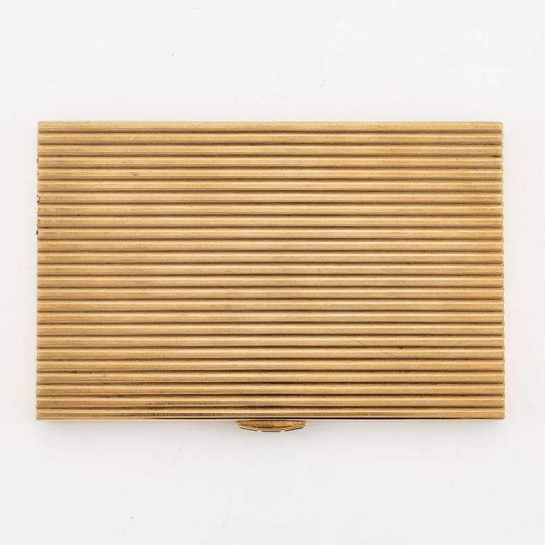 A Cartier 9 carat gold and calibré-cut sapphires cigarette case, London.