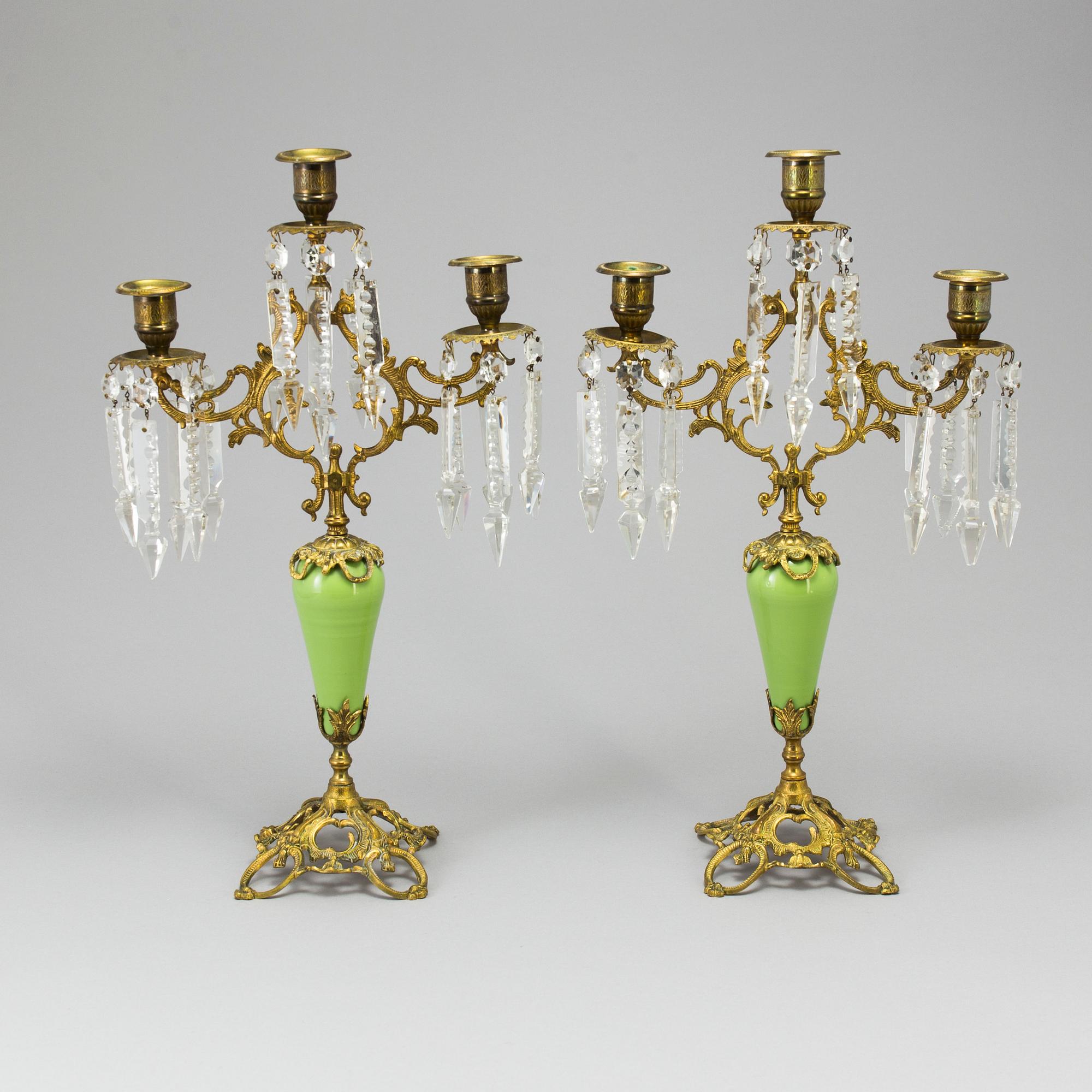 A pair of late 19th Century gilt candelabra.