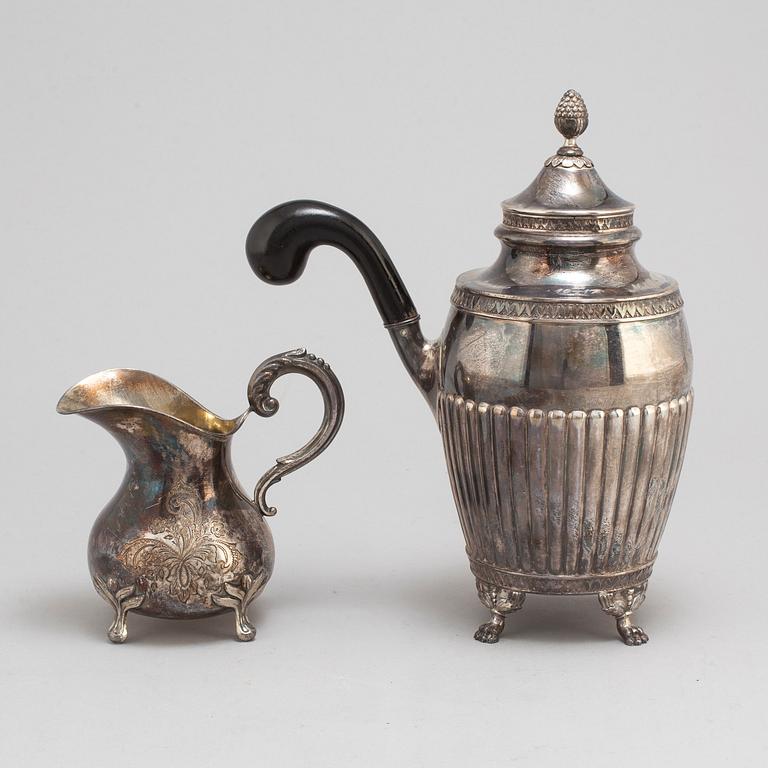 A silver coffee pot and creamer, Stockholm, 1875-1917.