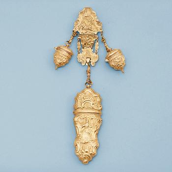 879. An 18th century gilt-bronze chantelaine.