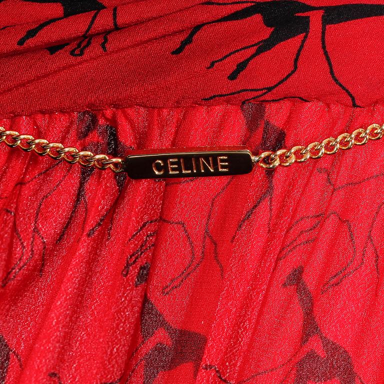 CÉLINE, a red silk dress, 1980's.