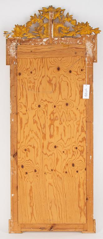 A mirror and console table from around the year 1900.