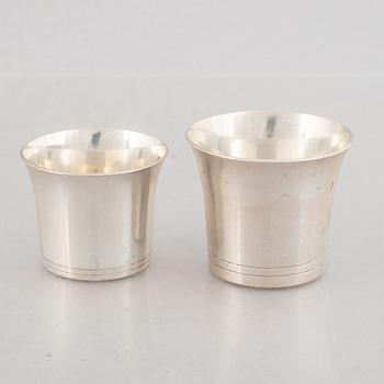 A set of sixteen Swedish silver cups, marks of K. Torndals Juvelerare AB, Stockholm 1955-1962.