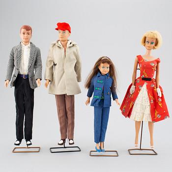 A collection of four Mattel 1960's Barbiedolls with accessories.