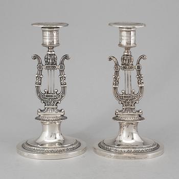 A pair of Swedish empire silver candlesticks by Adolf Zethelius, Stockholm 1826.