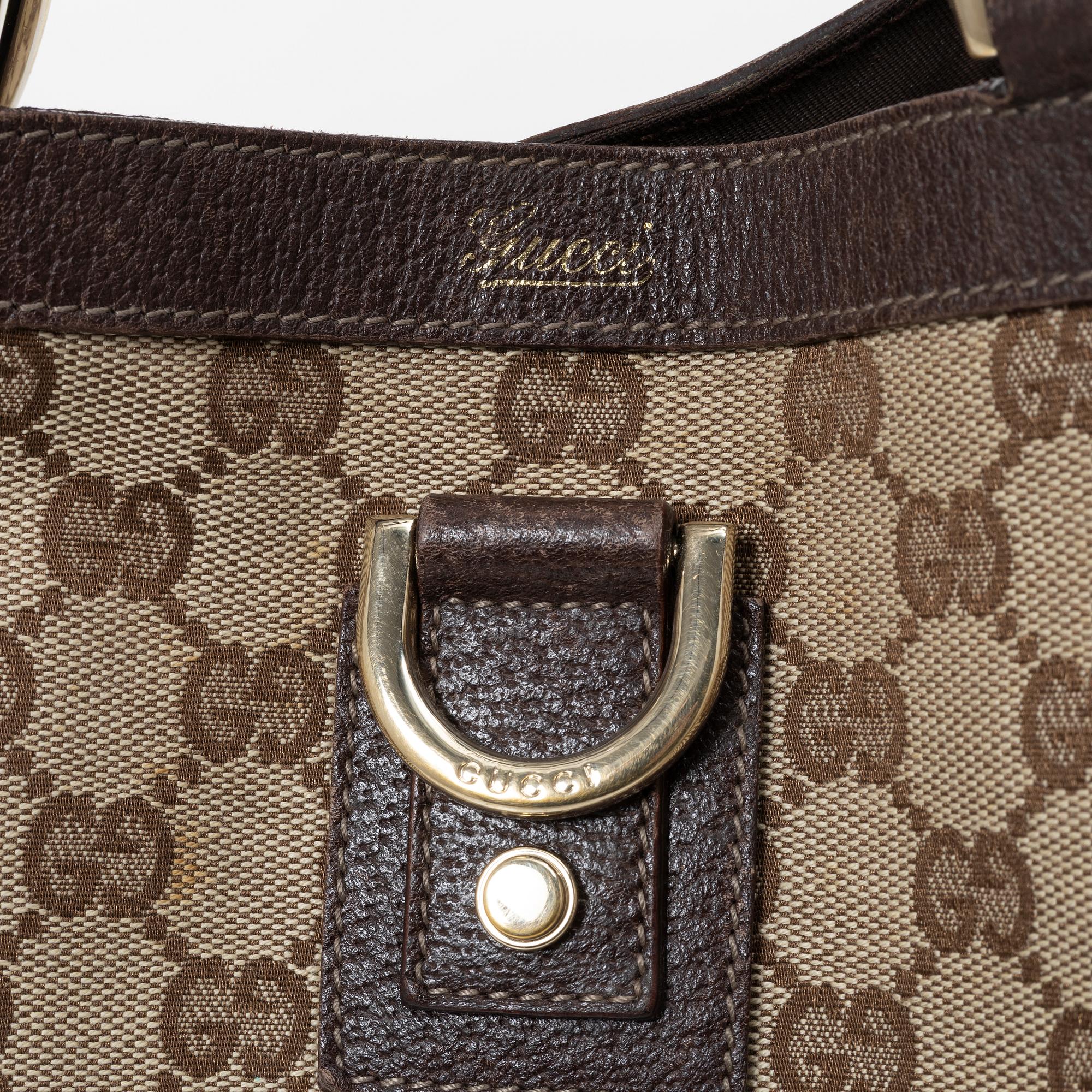 Gucci, a canvas and leather bag.