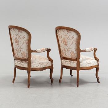 A sofa, two armchairs and two chairs, rococo style, first half of the 20th century.