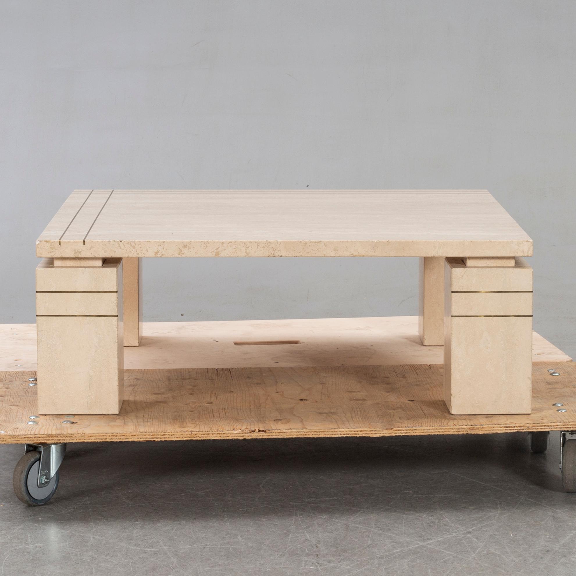 A 1970/80s travertin coffee table.