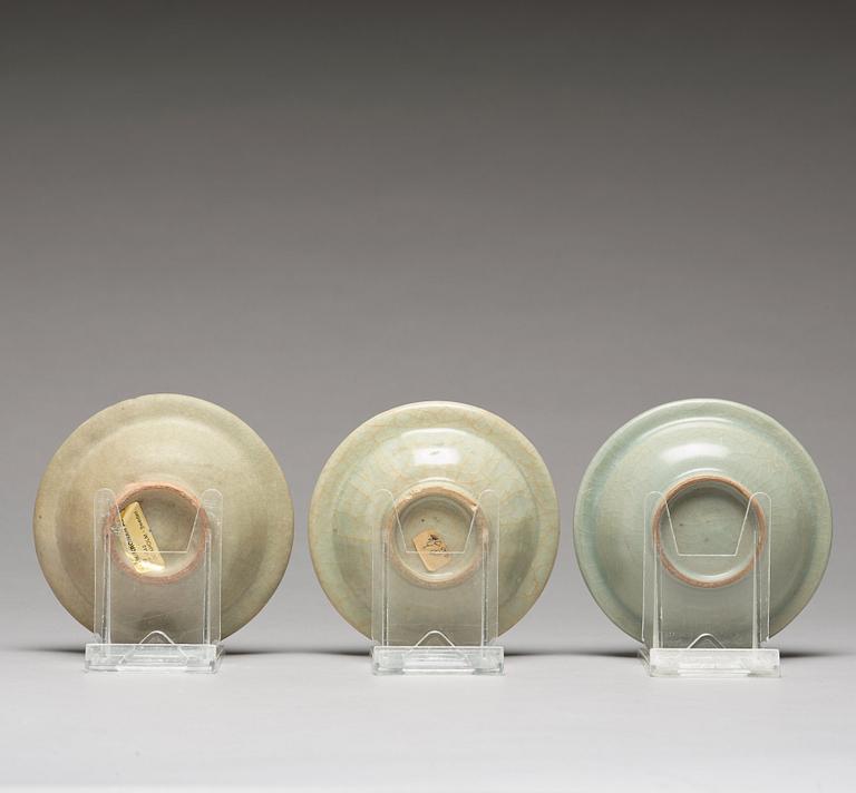 Three celadon glazed dishes, Yuan dynasty (1271-1368).