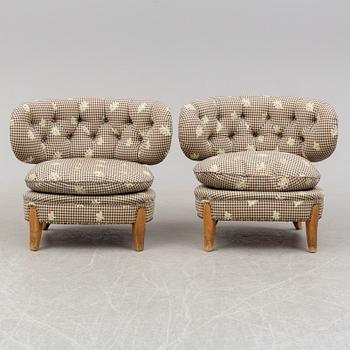 A pair of armchairs, designed by Otto Schultz, mid 20th century.