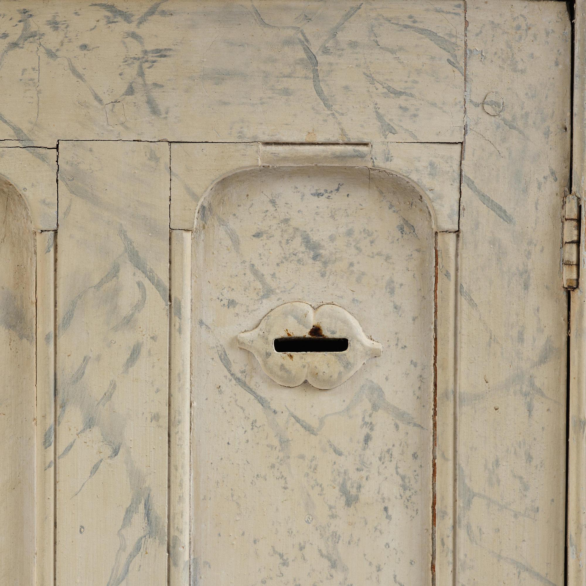 A Swedish column-shaped cabinet 19 th century.