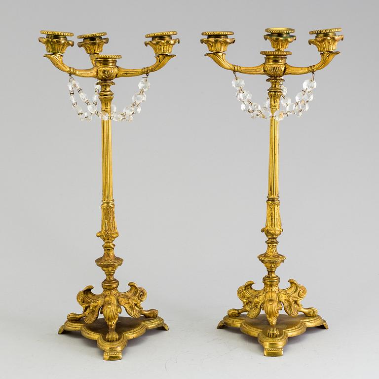 A pair of neorenaissance candelabras, about 1900.