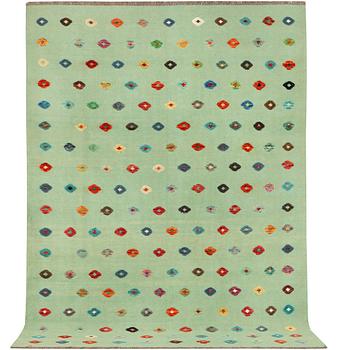 An Afghan kilim carpet, c. 296 x 201 cm.