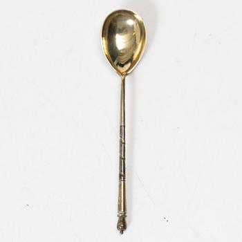 A Russian silver niello napkin ring and spoon, late 19th century-early 20th century.