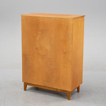 A 1950's/60's teak cabinet.