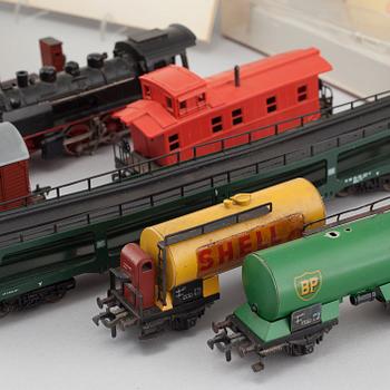 A collection of mainly Fleischmann toy trains, 12 pieces from the second half of the 20th century.