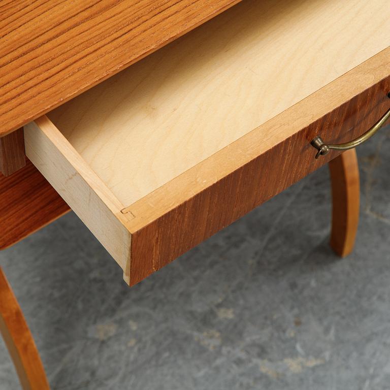 A pair of teak and birch bedside tables, mid 20th Century.