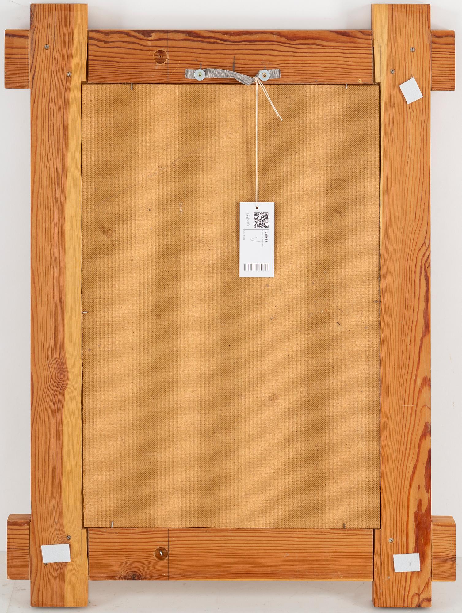 A 1980's pine mirror.