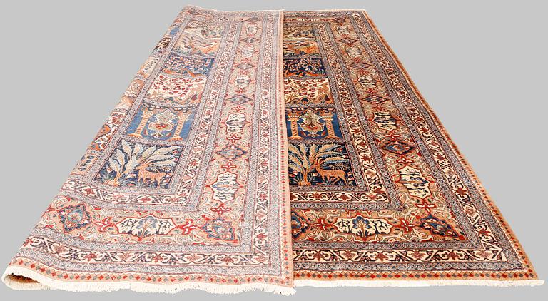 A figural Kashmar carpet, approx. 347 x 300 cm.