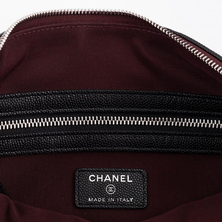 Chanel, a black caviar leather clutch, 2020.