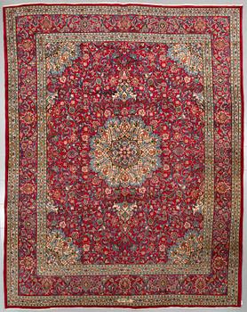 A Semnan rug, signed, 388 x285 cm.