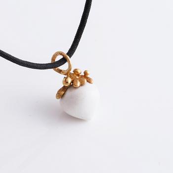 A bracelet, " My little world" by Charlotte Lynggaard.