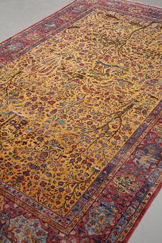 A carpet, a semi-antique silk Kashan figural, ca 309-310 x 204,5-207 cm.